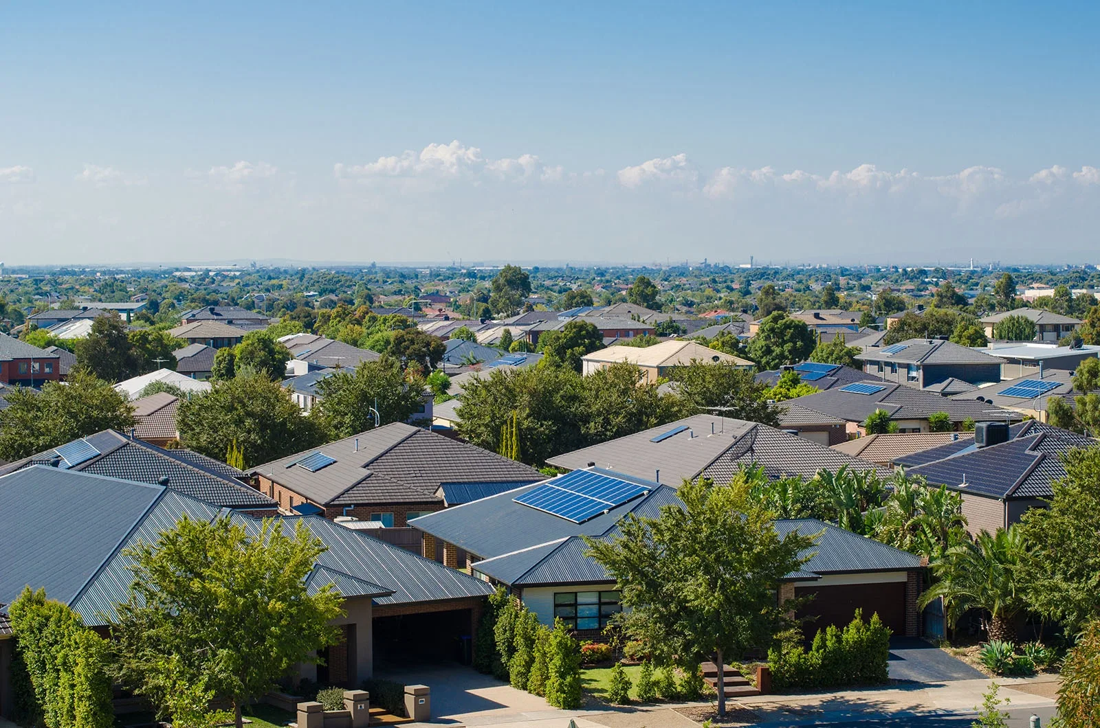 Australian suburban homes fitted with rooftop solar panels
